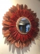 Magnifique miroir en raphia rouge et plumes