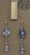 Boucles d’oreille pendantes spirale et perle bleu