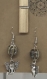 Boucles d’oreille pendantes avec perle céramique et breloque éléphant 