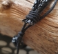 Bracelet cuir tressé et acier , perles et cabochon de verre  link