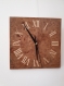 Horloge en marqueterie de bois