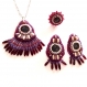 Parure en pierres de cordiérite taillées en france brodées de perles violet et rouge carmin