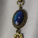 Porte-clé steampunk clé bleue et verre peint à la main - accessoire unique pour bijoux de sac