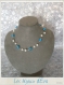 Collier composé de perles blanche  et turquoise