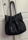 Vintage.grand sac à main bandoulière marque flora & co,couleur noire,cuir synthétique.modèle rare et très jolie.