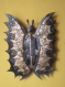 Relief papillon feuille métal