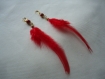 Boucles d'oreilles avec perle magique rouge