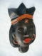 Masque africain en céramique, 2,ciré  noir .