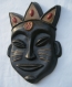 Masque africain en céramique 14, ciré noir .