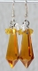 Boucles d'oreilles argentées avec goutte en cristal jaune et bicones en cristal jaune et transparent 