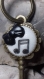 Porte clés original en forme de clé note de musique 