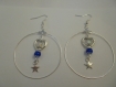 Boucles d'oreilles créole argenté et perles bleu et transparent 