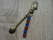 Porte clés ou bijou de sac cuisinière perles et bronze 