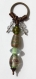 Porte-clefs avec perles à facettes transparentes et lampwork dans des nuances de vert pale 