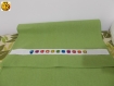 Torchon uni vert émoticone multicolore en coton