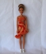 Robe type salsa orange au crochet pour poupée