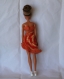 Robe type salsa orange au crochet pour poupée