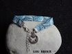 Bracelet tissus imprimé et breloque médaille papillon