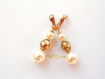 Clip d'oreilles dore avec perles et cristaux