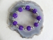 Bracelet élastique perles filets en métal violet 12mm.