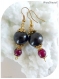 Boucles d'oreilles pierres naturelles rouges et perles de verre noires . crochets dorés.