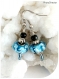 Boucles d'oreilles perles de verre bleues, crochets argentés.
