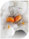 Boucles d'oreilles perles de verre oranges.