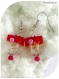 Boucles d'oreilles perles de verre carrées rouges. crochets argentés.