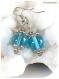 Boucles d'oreilles grosses perles bleues .