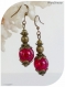 Boucles d'oreilles perles de verre rouges et bronze,