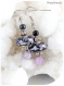 Boucles d'oreilles perles de verre noires et violettes .