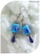 Boucles d'oreilles céramique et perles magiques bleues .