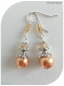 Boucles d'oreilles perles de verre et cristal swarovski orange.