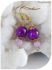 Boucles d'oreilles perles de verre violettes.