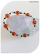 Bracelet perles de verre oranges et noires .