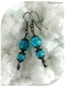 Boucles d'oreilles perles de verre bleues et noires.