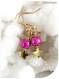 Boucles d'oreilles enfants en perles magiques roses et étoiles dorées.