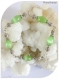 Bracelet perles de verre vertes œil de chat et perles argentées.