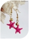 Boucles d'oreilles étoiles de mer roses .