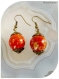 Boucles d'oreilles perles rousses en acrylique .
