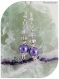 Boucles d'oreilles cristal swarovski et perles de verre violettes .