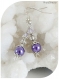 Boucles d'oreilles cristal swarovski et perles de verre violettes .