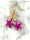 Boucles d'oreilles étoiles de mer violettes .