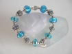 Bracelet élastique perles de verre bleues et perles argentées,