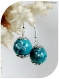 Boucles d'oreilles perles bleues 14 mm .