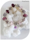 Bracelet élastique perles de verre violettes et roses , perles argentées.
