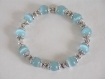 Bracelet élastique en perles de verre bleues œil de chat