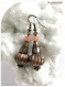 Boucles d'oreilles bronze et orange. crochet métal couleur bronze.