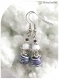 Boucles d'oreilles pierres teintées blanches et violettes et pierres onyx blanches. crochets argentés.