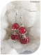 Boucles d'oreilles perles de verre rouges . crochets argentés.
